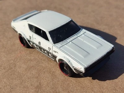 Hot Wheels Premium Nissan Skyline GT-R Police Car Diecast Vintage Retro Car - Image 1 of 4