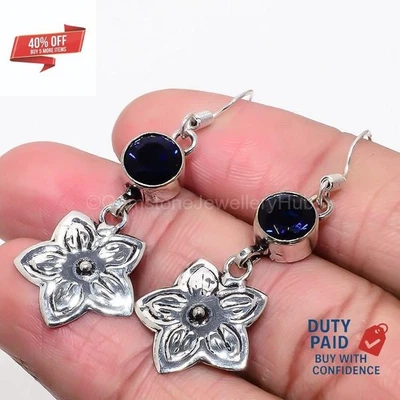 Pendientes colgantes de cumpleaños enchapados en plata de ley con zafiro azul natural Foto 1 de 4