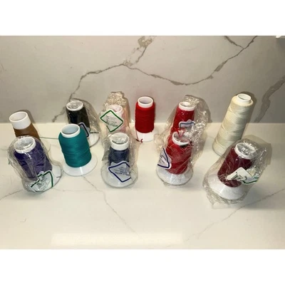 11 Spools of Woolly Nylon Sewing Thread  - 9 Different Colors - Image 1 of 4