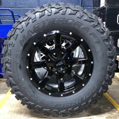 17x9 Moto Metal MO970 Black Wheels 33" MT MXT Tires 8X6.5 Chevy Silverado 2500 - Image 1 of 3