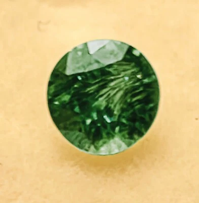 0.3  CT DEMANTOID GARNET HORSE TAIL NAURAL UNHEATED URAL HIGH DISPERSION - Image 1 of 2