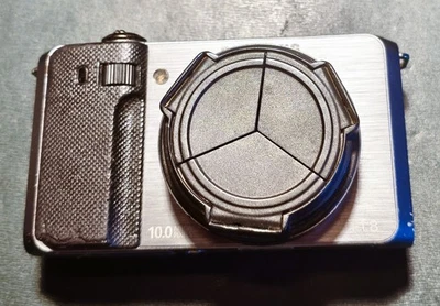 Samsung EX1 10,0 MP Digitalkamera mit JJCALC-5  Objektivdeckel/ defekt - Bild 1 von 4