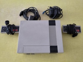 Nintendo NES Console + 2 manettes + super Mario Bros/ duck hunt