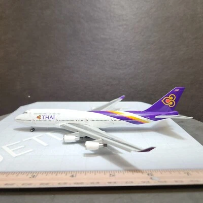 1/400 THAI AIRWAYS INT'L BOEING 747-400 04'S COLORS HS-TGG JC WINGS FLAPS DOWN - Imagem 1 de 4