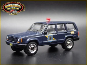 JEEP CHEROKEE XJ SPORT 4 DOOR MICHIGAN STATE POLICE 1:64 SCALE DIECAST MODEL CAR - Picture 1 of 8
