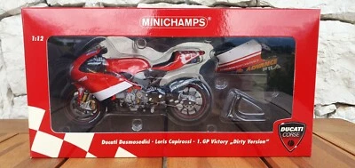 MINICHAMPS 1:12 DUCATI DESMOSEDICI - LORIS CAPIROSSI 1GP VICTORY DIRTY-122031496 - Immagine 1 di 4
