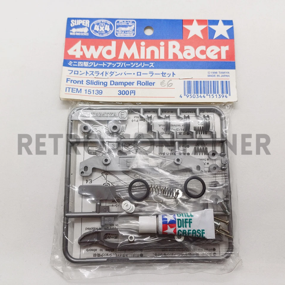 Vintage Tamiya MINI 4WD 4-WD - Tune-Up Parts 15139 - Front Sliding Damper Roller - Immagine 1 di 1