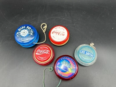 Yo Yo Yo vintage a granel. Coca-Cola, salvavidas, mamba negra Foto 1 de 2