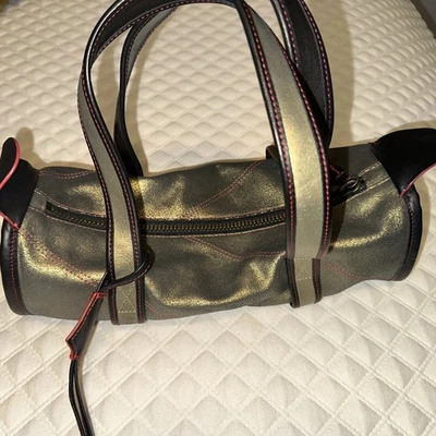 Bolso de zapatos vintage para mujer Nike 1972 Villard de cuero con ruedas dorado Foto 1 de 4