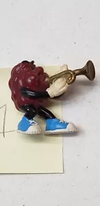 FIGURA DE PVC VINTAGE APLAUSE CALIFORNIA RAISINS con TROMPETA...1 - Imagen 1 de 2