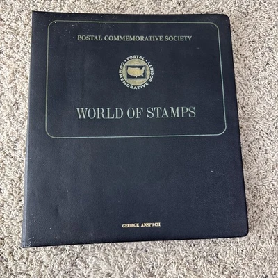 Postal Commemorative Society World Of Stamps Album With 5 Sets - Image 1 of 4