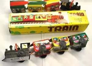 TRAIN CLOCK WORK IN LATTA E PLASTICA 28cm.TOYLAND MS203 LOCOMOTIVA, TRENO - Imagen 1 de 1