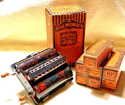 1928 ROLMONICA HARMONICA Instrumento de baquelite marmoreada com 7 rolos tudo em caixas originais - Imagem 1 de 4