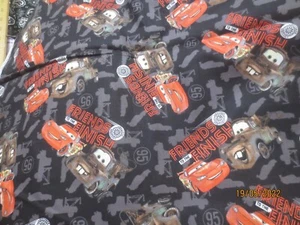 44 x 44" Disney Pixar Friends to the Finish Orange Cars on Black cotton fabric - Picture 1 of 4