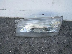 em909155  Mitsubishi Mirage Sedan 1997 2000 2001 2002 LH Halogen Headlight OEM - Picture 1 of 10