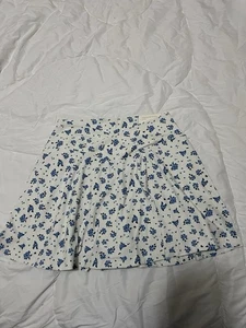 Blogilates Damen Criss Cross Slit High-Rise Skort - Creme/Blau Blumenmuster L - Bild 1 von 4
