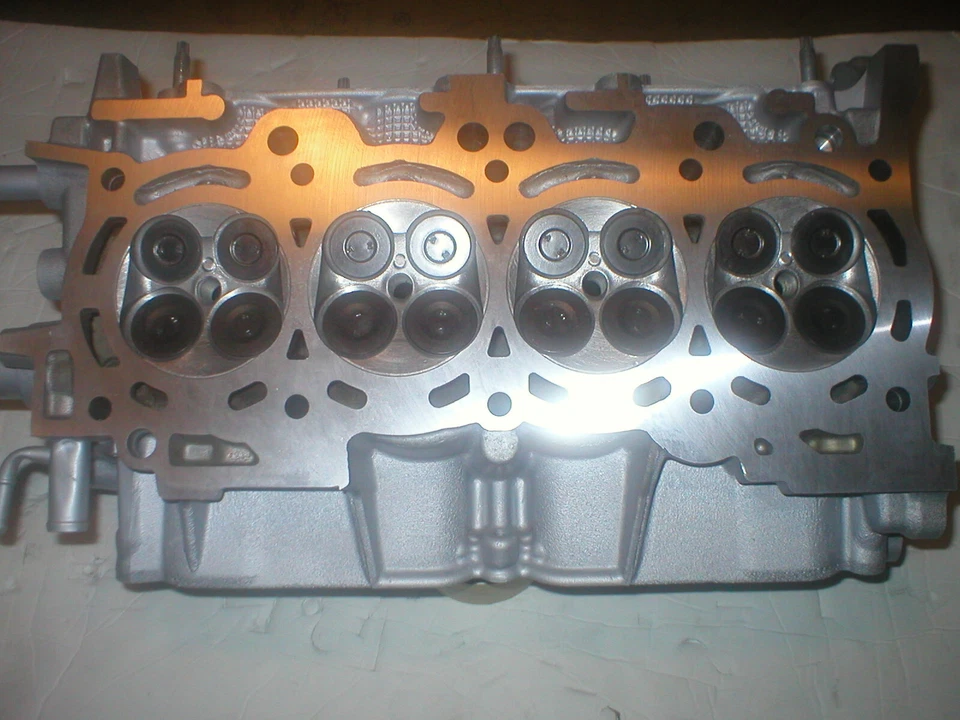 TOYOTA 1.8 VIBE COROLLA 2009-2018 2ZRFE 2ZRFAE REBUILT CYLINDER HEAD NO CORE REQ Foto 1 de 4