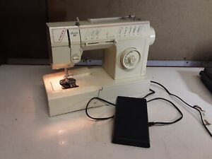 Singer Melodie 20 Free Arm Zigzag And Straight Stitch Sewing Machine Model 5802C
