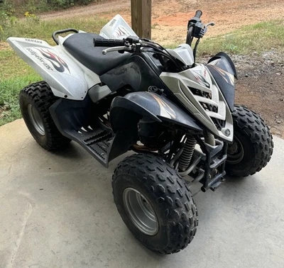 Yamaha Raptor 90 Fender Set Plastics White Black OEM - Image 1 of 4
