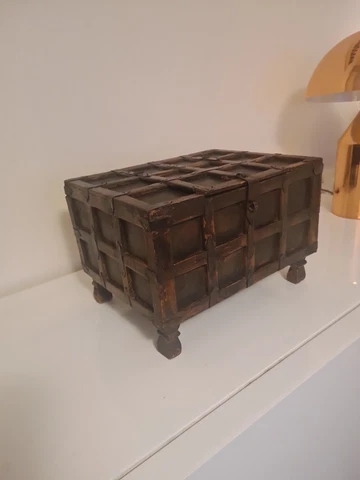 An early 19th century panelled fruitwood coffer or trunk with iron fittings Cover