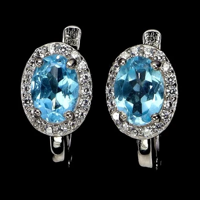 Pendientes de plata esterlina ovalados Black Friday topacio azul suizo 7x5 mm joyería gema Foto 1 de 4