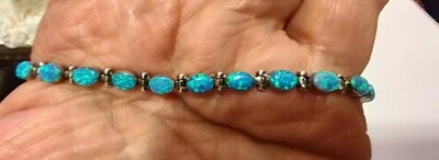 Brazalete de plata de ley 925 con ópalo de fuego simulado de corte ovalado de 8" de largo ((65)) Foto 1 de 4