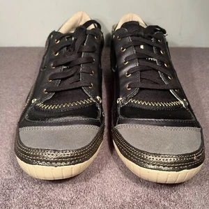 Scarpe da sneaker boutique Cushe NWOB nere/oro USA DONNA taglia 10 UK 8 EUR 41 - Foto 1 di 11