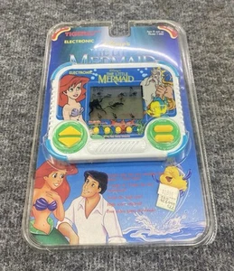 Tiger Disney The Little Mermaid Electronic Handheld LCD Game 1991 NEVER USED! - Picture 1 of 3