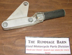 PASSENGER RIGHT SIDE REAR FOOT PEG and BRACKET ------ 1987 HONDA CMX450 REBEL - Picture 1 of 1