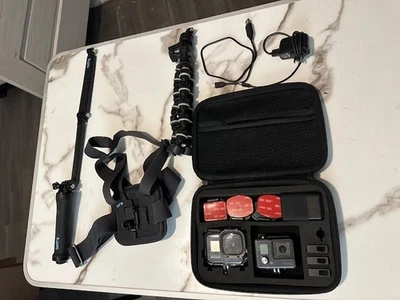 Go Pro 8 and Hero – with 4 batteries and accessories and case - Image 1 of 4