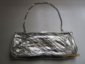 Aldo Silver Clutch Handbag w inside zipper & Top closure  12 by 5 w chain