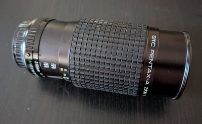 PENTAX SMC Pentax-A  1:4 Zoom 70-210mm manual focus lens w/ Hoya filter & covers - Image 1 of 4