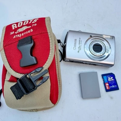 Cámara digital Canon PowerShot SD870 IS 8 MP con cargador, tarjeta SD de 4 GB y estuche Foto 1 de 4