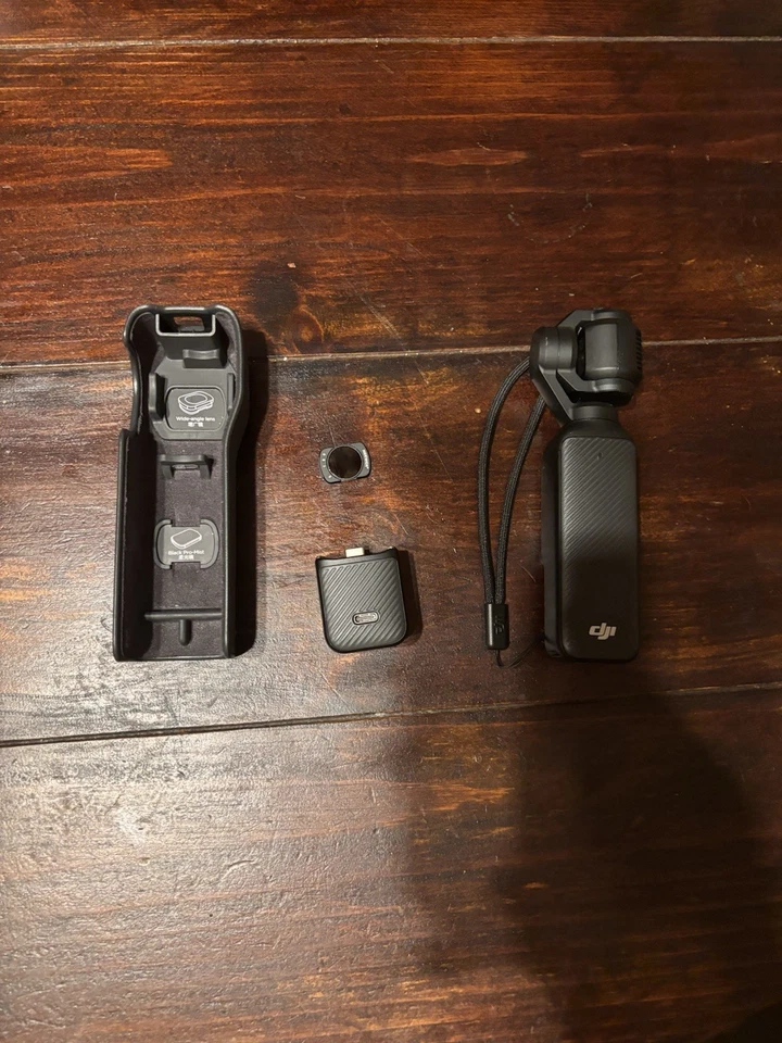 DJI Osmo Pocket 3 con estuche y base, incluye filtro ND64-512 Foto 1 de 4