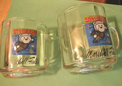MARSHALL FIELD'S 2001 SANTA BEAR Clear Glass Christmas Mugs Set Of 2 - Image 1 of 4