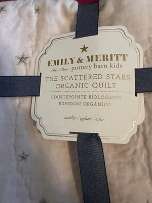 Manta acolchada Pottery Barn Kids Emily & Meritt estrellas dispersas oro rosa para cuna Foto 1 de 3