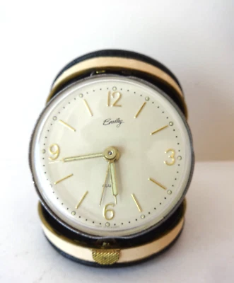 VTG BRADLEY TRAVEL ALARM CLOCK CLAM SHELL FOLD UP GERMANY ROUND FACE WINDS TICKS - Image 1 of 4