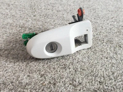 2009 Chevrolet Cobalt coupe right door exterior handle lock cylinder white - Image 1 of 2