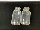 set of 2 vintage pyrex baby bottles/4 1/2 in tall/ excellent condition/ 4 oz