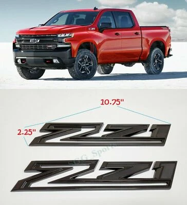 Chevy Silverado Z71 2019-2023 emblema OEM guardabarros negro brillante 84632695 2 un. Foto 1 de 4