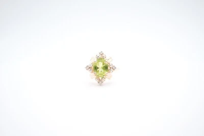 14K Yellow Gold Oval Peridot and Diamond Flower Four Prong Ring - Image 1 of 4