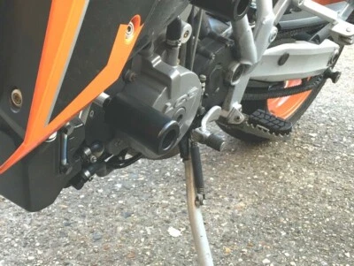 KTM 950  990 SUPERMOTO LOWERS CRASH PROTECTION PUCKS KNOBS ENGINE SLIDERS SAVERS - Image 1 of 4