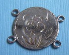 Love token flower coin charm