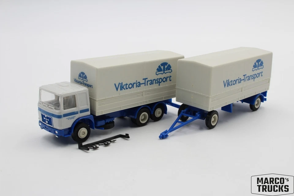 Herpa MAN F8 flatbed/curtain-side drawbar truck "Viktoria-Transport" 1:87 /H2590 - Image 1 of 1