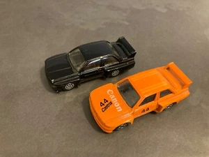 2x CORGI JUNIORS BMW M3 Naranja Canon Castrol 44 y Raro Negro con Borde Dorado Coche - Imagen 1 de 21