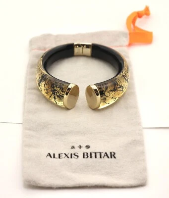 PULSERA CÓNICA CON BISAGRAS ALEXIS BITTAR LÁMINA DORADA CON DETALLES NEGROS Foto 1 de 4