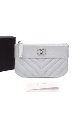 CHANEL Metallic Silver Caviar Chevron Quilted Small Mademoiselle Zip Pouch Case - Image 1 of 4