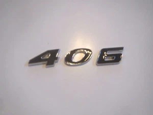 EMBLEMA DEL MALETERO FORD 406 ID MOTOR FENDER CAPÓ ESCOBA CUARTO PANEL - NEGRO - Imagen 1 de 1