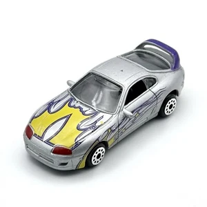 MotorMax #6012 Toyota Supra 1:64 Diecast Silver w/ Yellow & Purple Flames - Picture 1 of 6