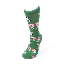 COWS ALL OVER GREEN PAIR OF NOVELTY SOCKS